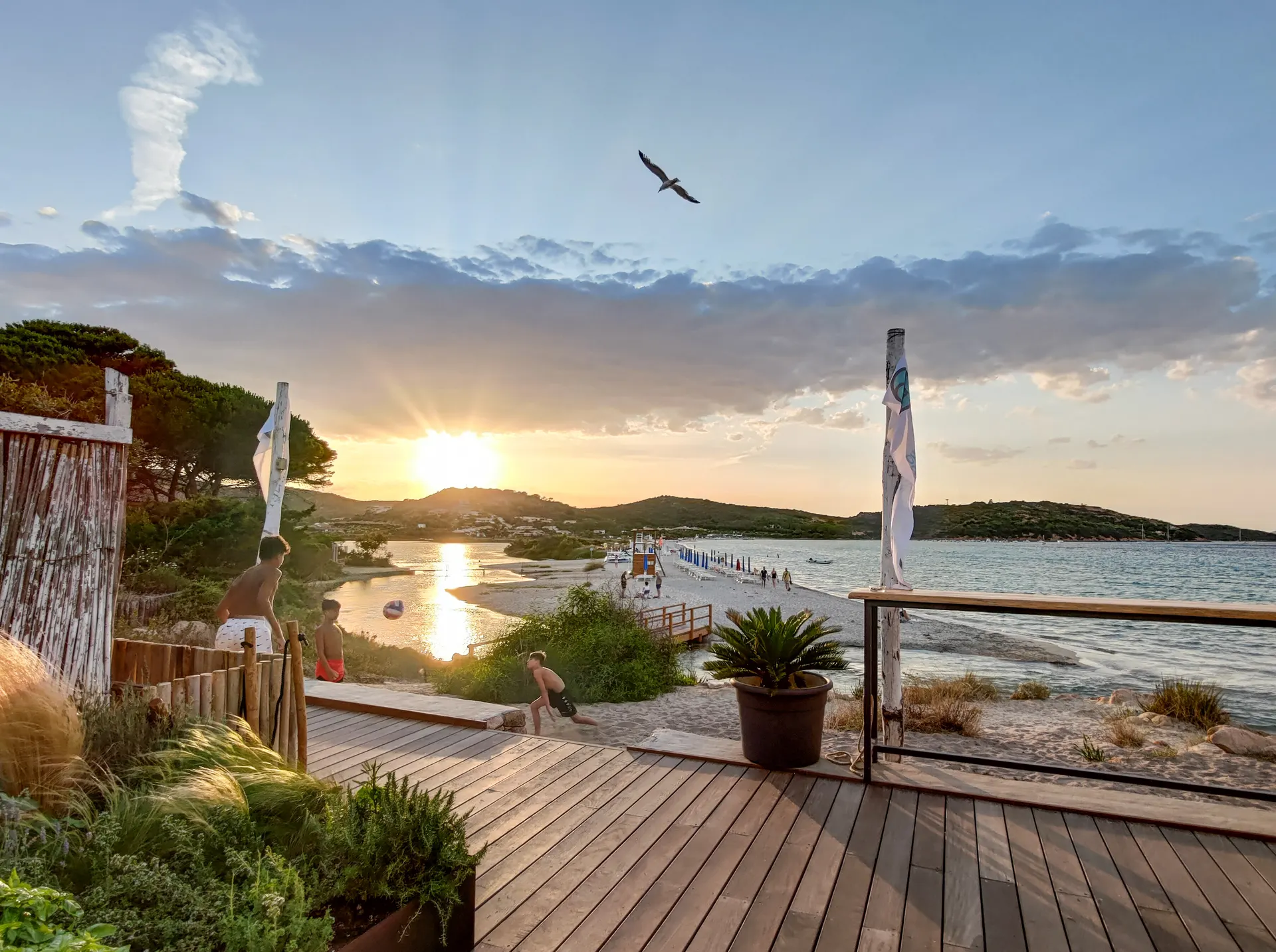 Sunset over Porto Taverna from the beach bar deck