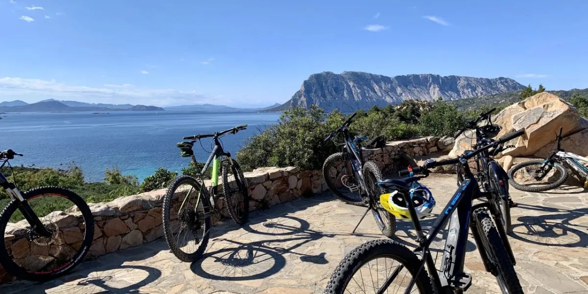 Mountain bike handlebar facing Tavolara island