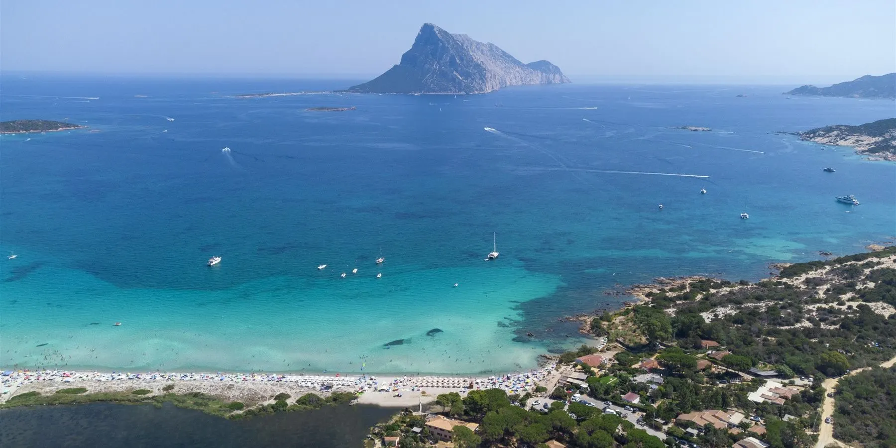 Aerial view of the bay of Porto Taverna with Tavolara island offshore