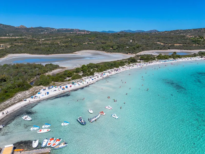 Turquoise bay on the north-east coast of Sardinia under a clear sky