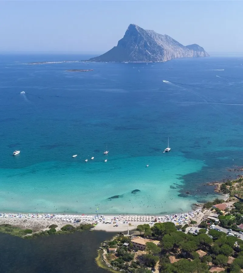 Porto Taverna beach with white sand and turquoise water