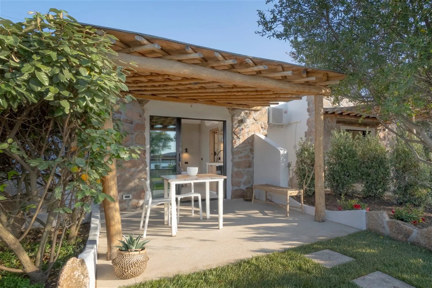 Granite and wood pergola of a renovated apartment