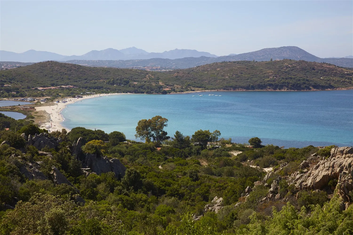 Crystal-clear water along Porto Taverna beach